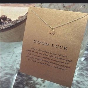 Women’s gold elephant necklace